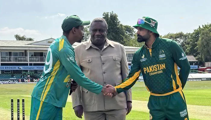Pakistan Champions captain Mohammad Hafeez (right) and South Africas Aaron Phangiso shake hands at the toss for their WCL 2025 match at the Grace Road in Leicester on July 25, 2025. — Instagram/wclpakistanchampions