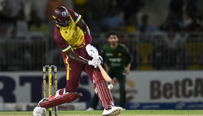 Jason Holder of the West Indies hits a four on the final ball to give the hosts a two-wicket win over Pakistan in their second T20I match at Lauderhill, Florida, to level to series at one win each © Chandan Khanna / AFP