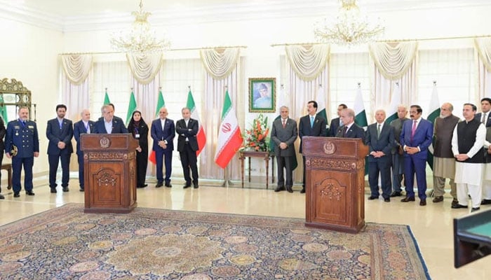 PM Shehbaz (right) and Iran president adress a joint press conference in Islamabad on August 3. — PID