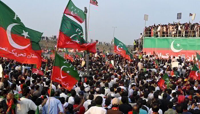 Activists of Pakistan Tehreek-e-Insaf (PTI) take part in a public rally on the outskirts of Lahore on September 21, 2024. — AFP/File