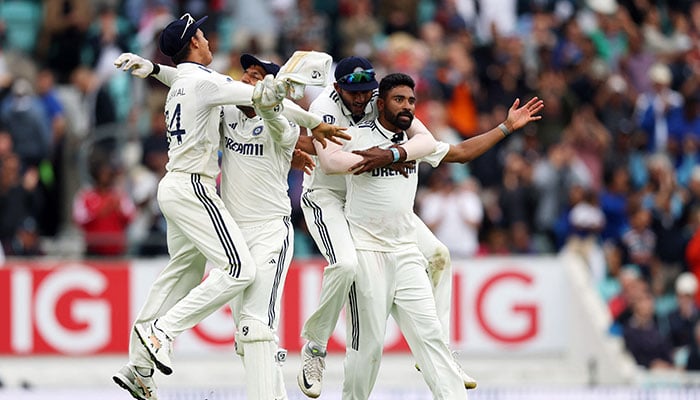 Indias Mohammed Siraj celebrates with teammates after taking the wicket of Englands Gus Atkinson and India winning the Fifth Test to draw the test series at Kia Oval, London, Britain, August 4, 2025. — Reuters
