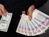 Iran moves to slash four zeros from rial in currency reform push