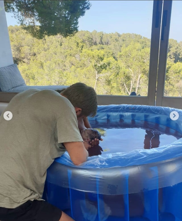 Calvin Harris welcomes son Micah with raw, at-home water birth photos