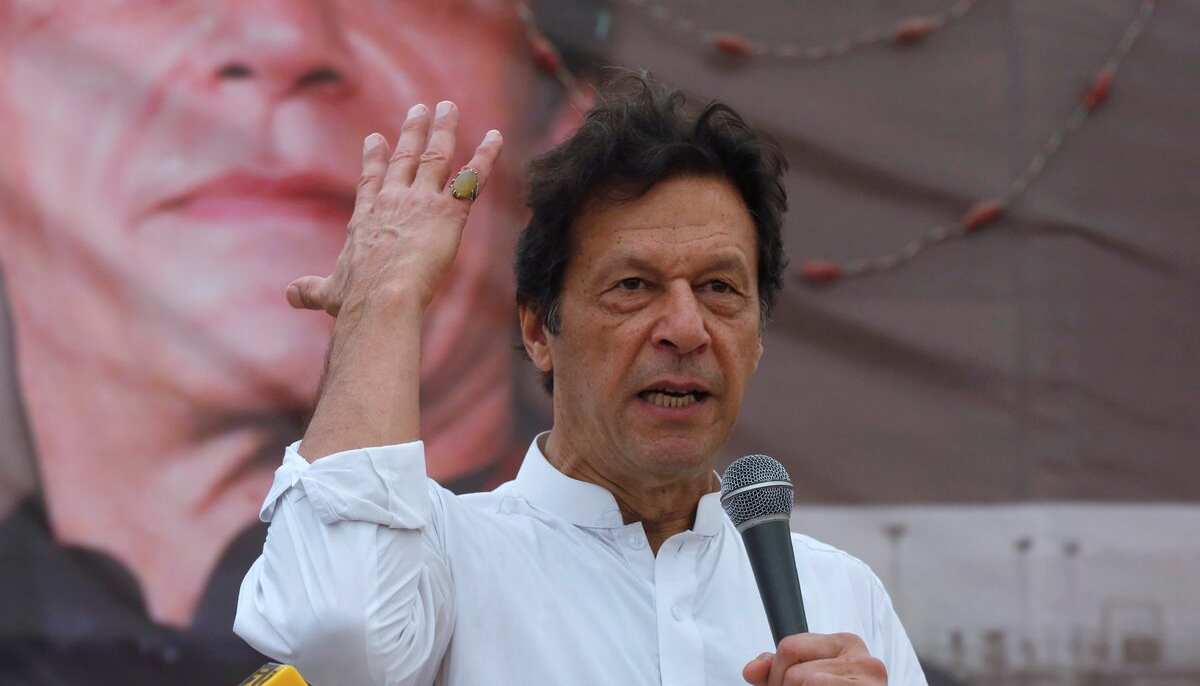 Imran Khan, PTI founder, gestures while addressing his supporters during a campaign meeting ahead of general elections in Karachi on July 4, 2018. — Reuters