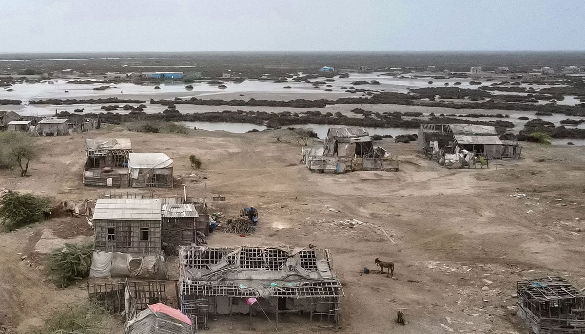 Abandoned houses are pictured in one of the villages of Kharo Chan town, in the Indus delta on June 25, 2025. — AFP