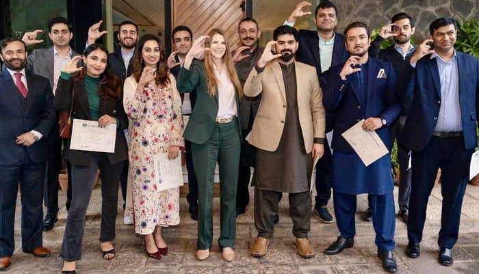 British High Commissioner to Pakistan, Jane Marriott, poses with Pakistani students at British High Commission in Islamabad. — X/@JaneMarriottUK