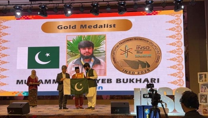Pakistans Muhammad Tayyab Bukhari receives a gold medal at the 2nd International Nuclear Science Olympiad in Kuala Lumpur, Malaysia, on August 5, 2025. —APP