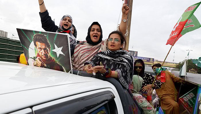 Supporters of  former PM Imran Khan and PTI take part in a nationwide protest demanding his release on the second anniversary of his jailing, in Karachi, on August 5, 2025. — Reuters