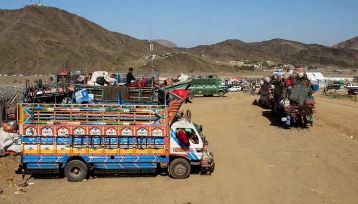 Trucks transporting Afghan nationals, who were expelled from Pakistan, are parked as refugees wait for registration at the Omari refugee camp in Mohmand Dara, Torkham border, Nangarhar province, Afghanistan, April 15, 2025. — Reuters