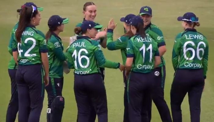 Screengrab shows Irelands Orla Prendergast (top, centre) celebrates with teammates after dismissing Pakistans Muneeba Ali during their first T20I at the Clontarf Cricket Club in Dublin on August 6, 2025. — X/@cricketireland