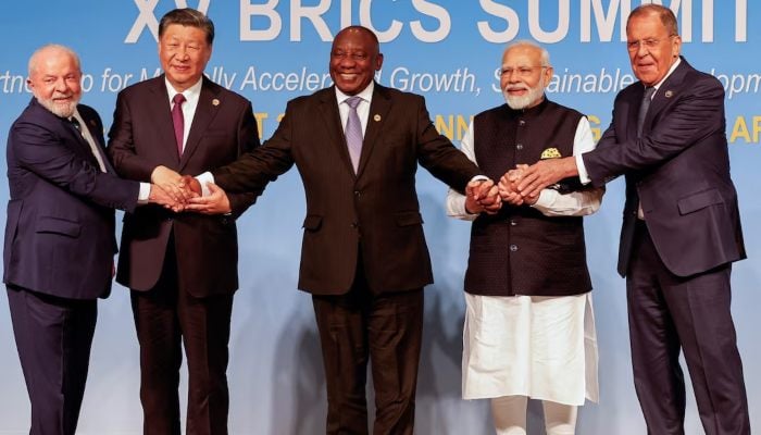 President of Brazil Luiz Inacio Lula da Silva, President of China Xi Jinping, South African President Cyril Ramaphosa, Prime Minister of India Narendra Modi and Russias Foreign Minister Sergei Lavrov pose for a BRICS family photo during the 2023 BRICS Summit at the Sandton Convention Centre in Johannesburg, South Africa, on August 23, 2023. — Reuters