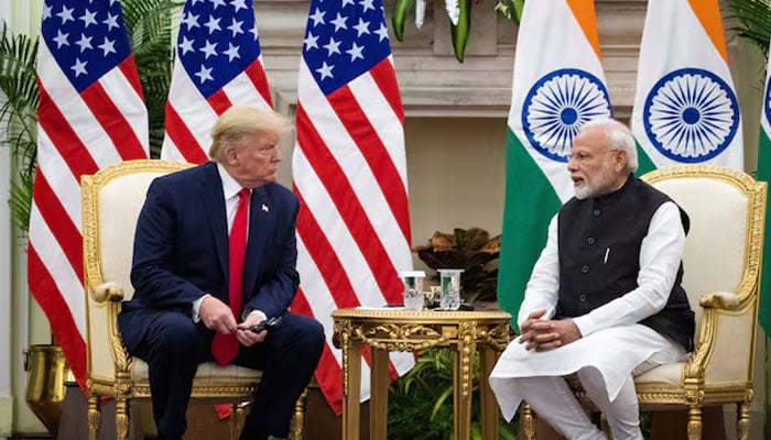Indian Prime Minister Narendra Modi speaks to U.S. President Donald Trump during a meeting at Hyderabad House in New Delhi, India, February 25, 2020. — Reuters