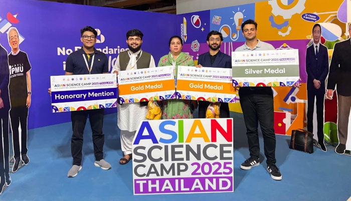 Pakistan team members, along with their medals pose for a group photo at the Asian Science Camp 2025 in Thailand. — APP