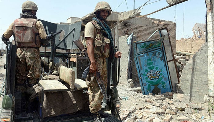 Pakistan Army soldiers patrol during a military operation against Taliban militants, in the main town of Miramnshah in North Waziristan. — AFP/File