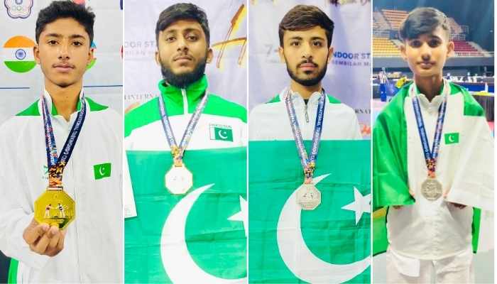 Pakistan athletes pose with medals after securing victories at the Hero Open Taekwondo Championship in Malaysia on August 10, 2025. — Reporter
