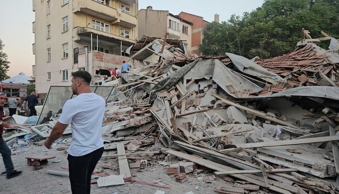 People search for survivors in a collapsed building after an earthquake hit Sindirgi, in the western Balikesir province, Turkey, August 10, 2025. —Reuters