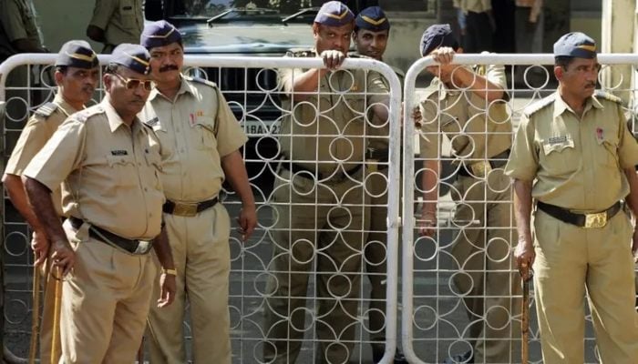Indian policemen stand guard at the Central Investigation Bureau (CBI) office, Mumbai, India. — Reuters