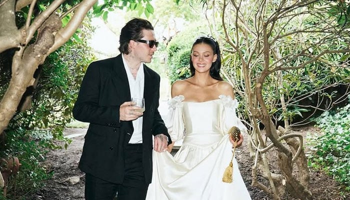 Nicola Peltzs vow renewal ceremony photos with Brooklyn Beckham emerge as new diss to his family
