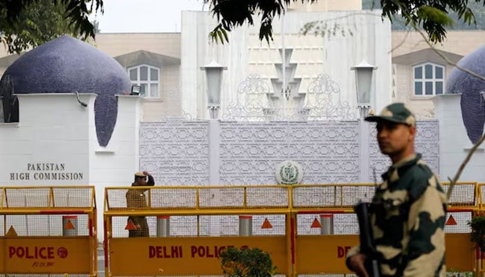 An armed policeman stands guard outside Pakistan High Commission in New Delhi, India. — Reuters/File