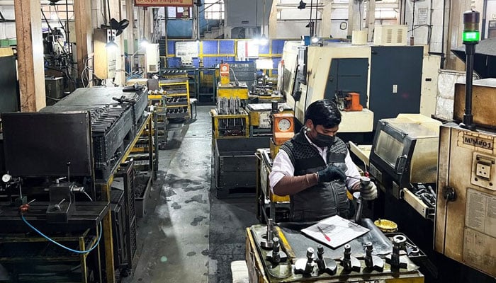An employee works inside an engineering goods export unit in the manufacturing hub of Faridabad on the outskirts of New Delhi, India. — Reuters/File