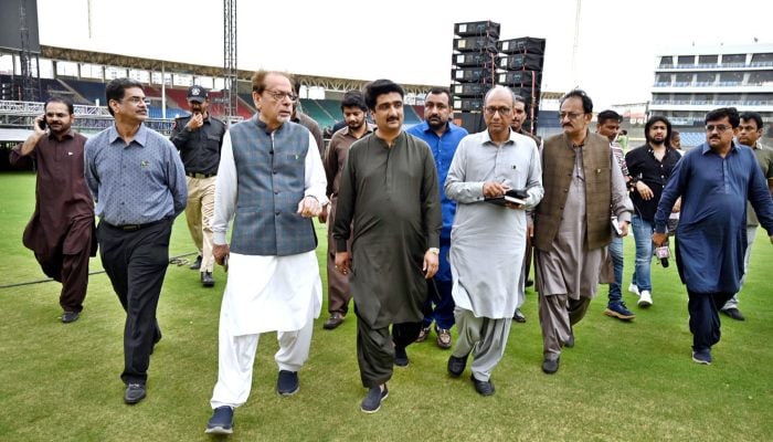 Provincial Ministers Saeed Ghani and Syed Zulfiqar Ali Shah, along with Arts Council Karachi President Ahmed Shah, are reviewing preparations for a mega musical concert at National Bank Stadium Karachi. — APP