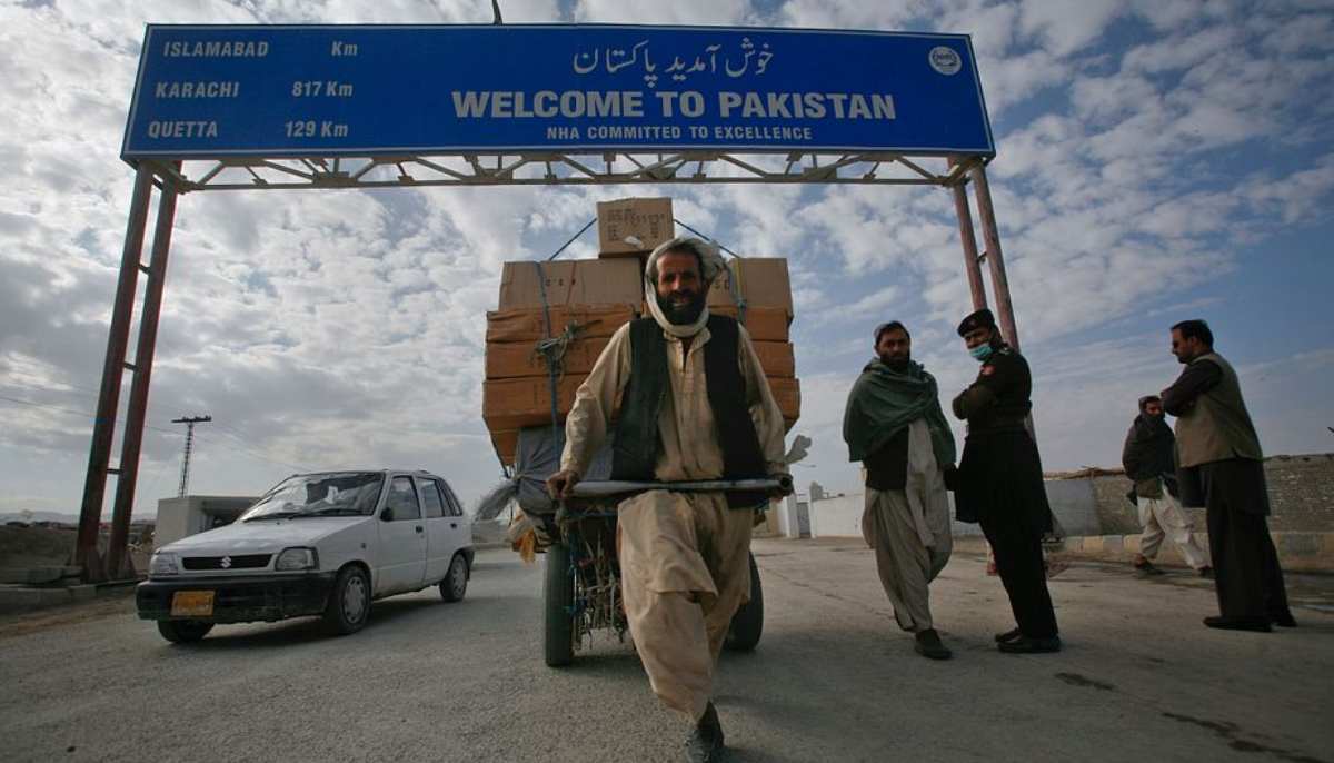 A man pulls a cart at the Pak-Afghan border. — Reuters