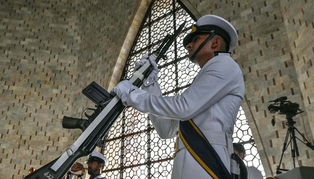 A Pakistani naval cadet stands guard at the mausoleum of Muhammad Ali Jinnah, during Independence Day celebrations in Karachi on August 14, 2025. — AFP