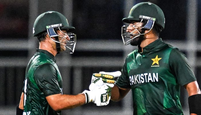 Pakistan Shaheens opening batter Yasir Khan (right) and Khawaja Nafay doing fist bumps after reaching 100-run opening stand during the Top End T20 series opening match against Bangladesh A at the TIO stadium in Darwin, Australia on August 14, 2025. — Facebook/NT Cricket