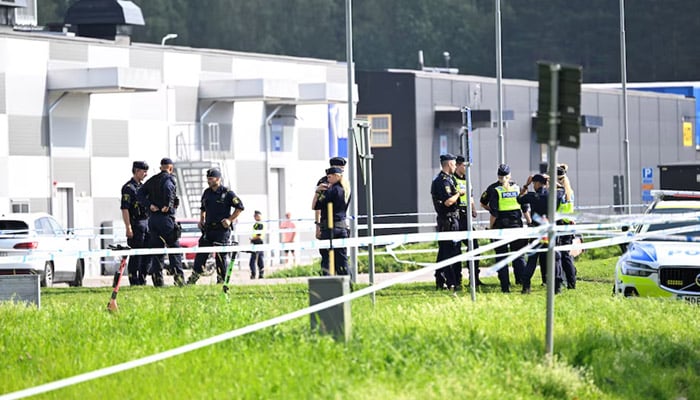 Police officers work at the scene outside a mosque after a shooting, in Orebro, Sweden August 15, 2025. — Reuters
