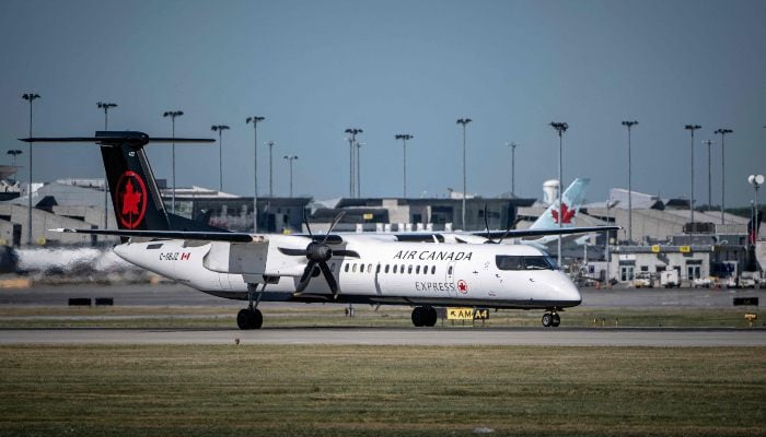 An Air Canada Express plane is seen on the tarmac of the Pierre-Elliott Trudeau Airport in Montreal, Quebec, Canada, on August 15, 2025. — AFP