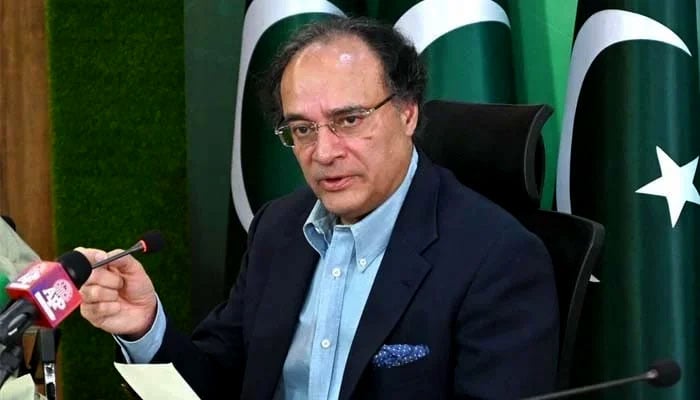 Federal Minister for Finance and Revenue Senator Muhammad Aurangzeb addressing media persons at PTV Headquarters.— APP/File