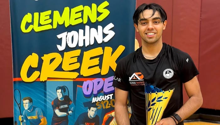 Pakistan’s squash player Ashab Irfan poses with the trophy after winning the Johns Creek Open in the USA on August 18, 2025. — Reporter