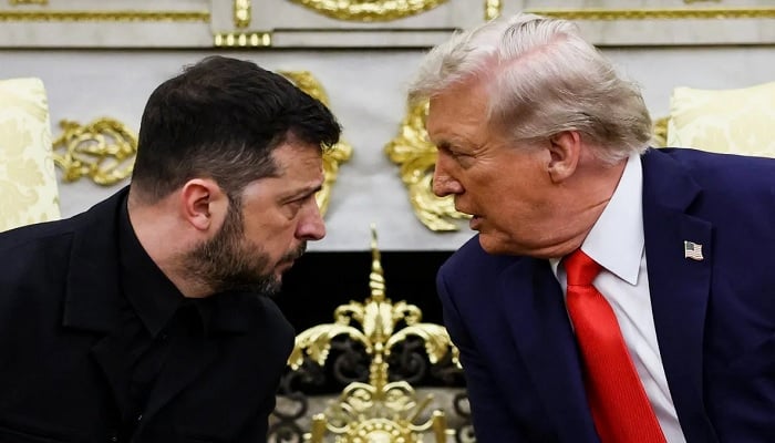 Volodymyr Zelenskyy speaks with Donald Trump in the White House on Monday. — Reuters
