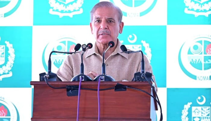 Prime Minister Shehbaz Sharif addressing flood victims in Buner, on August 20, 2025. — APP