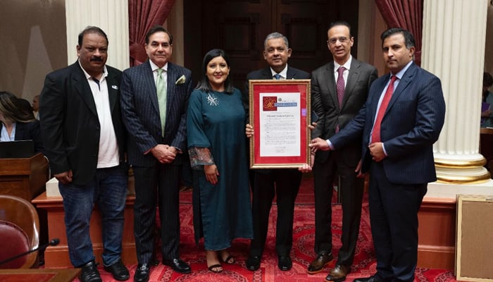Senator Melissa Hurtado (centre left) along with Pakistan Ambassador to the United States, Rizwan Saeed Sheikh, after the resolution was passed. — Pakistan Emabssy in US