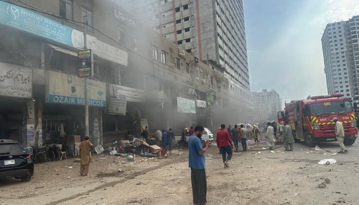 Firefighting team conducting dousing blaze after blast at firecracker warehouse at MA Jinnah Road, Karachi, on August 21, 2025. — Geo News