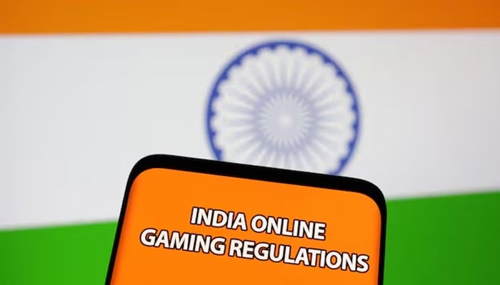 The words India online gaming regulations are displayed in front of an Indian flag in this Illustration taken September 14, 2022. — Reuters
