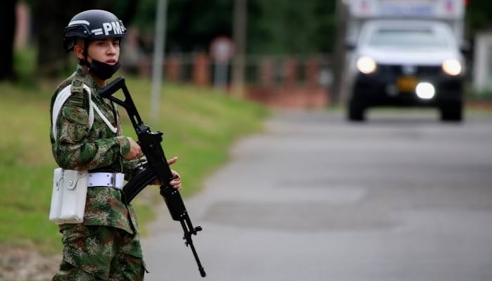 A soldier patrols around a military battalion where a car bomb exploded, according to authorities, in Cucuta, Colombia, US, June 15, 2021.—Reuters