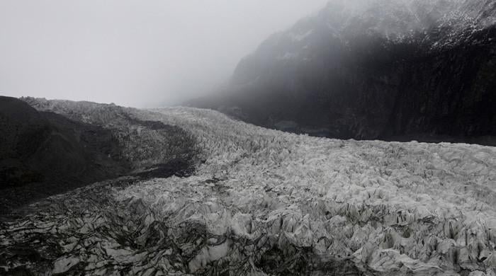 Bridge the climate-debt divide