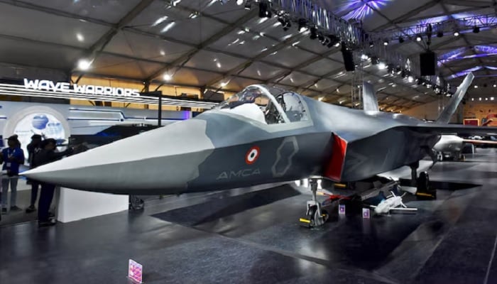 Visitors stand next to a prototype of the Advanced Medium Combat Aircraft (AMCA), Indias most advanced stealth fighter jet, at the Aero India 2025 air show at Yelahanka air base in Bengaluru, India, February 11, 2025. —Reuters