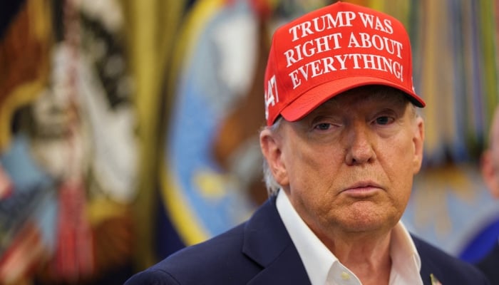 US President Donald Trump wears a Trump Was Right About Everything! hat, as he makes an announcement on the 2026 FIFA World Cup, in the Oval Office at the White House in Washington, DC, US, August 22, 2025. — Reuters