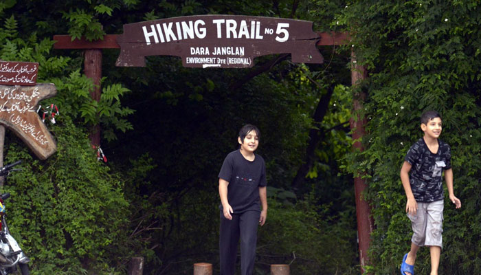 A view of hikers came out from trail 5 after reopen as capital administration closed all Hiking Trail couple of days due to recent torrential rainfall. — INP/File