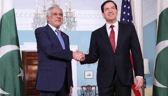 Deputy Prime Minister and Foreign Minister Ishaq Dar and US Secretary of State Marco Rubio shake hands for photographers assembled at the State Department in Washington, DC, on July 25, 2025. — Reuters
