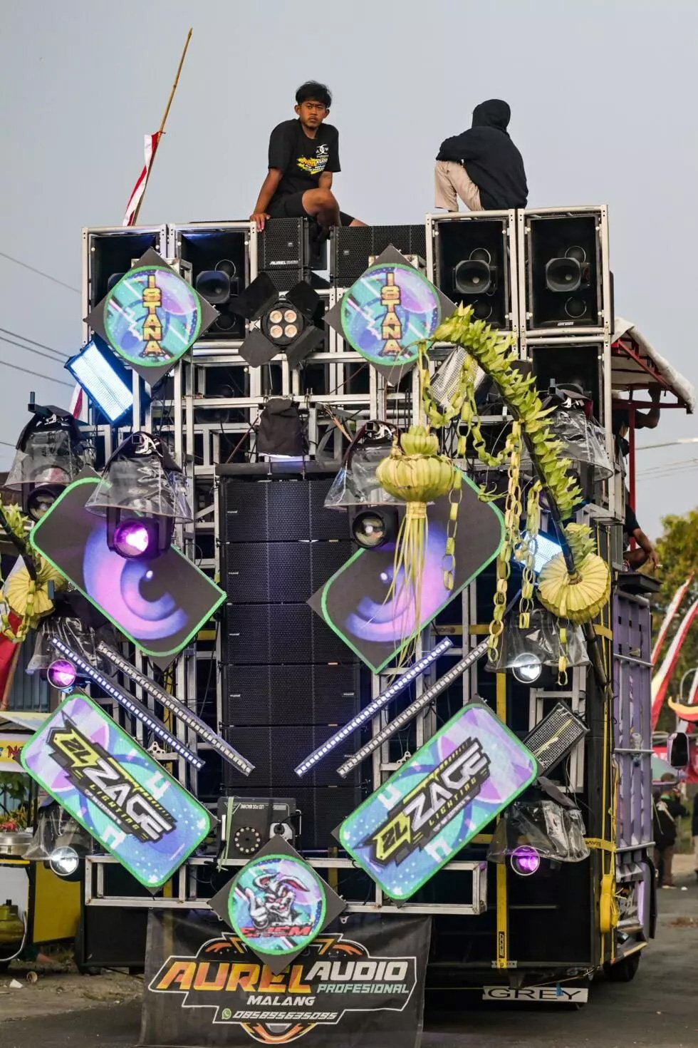Towering loudspeaker stacks used at celebratory street parties have drawn the ire of local authorities and calm-seeking neighbours. — AFP