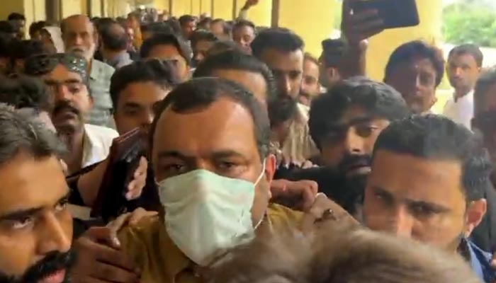 Police present Farhan Ghani before ATC in Karachi on August 25, 2025. — Geo News