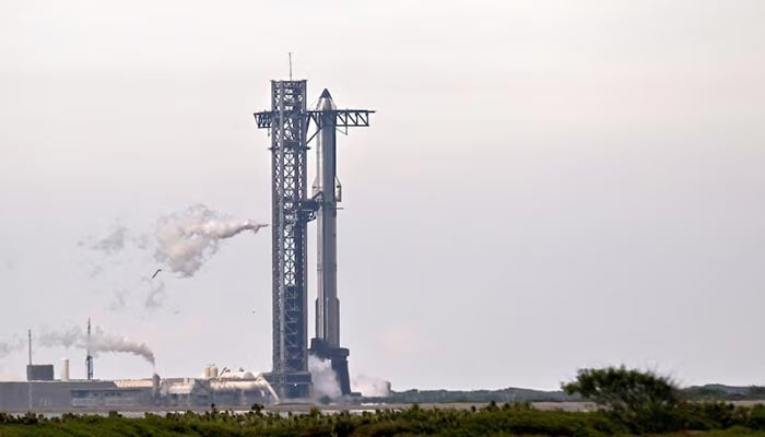 A SpaceX Super Heavy booster carrying the Starship spacecraft vents before the launch is scrubbed to allow for troubleshooting of a ground issue at the companys launch complex in Starbase, Texas, US, August 24, 2025. — Reuters