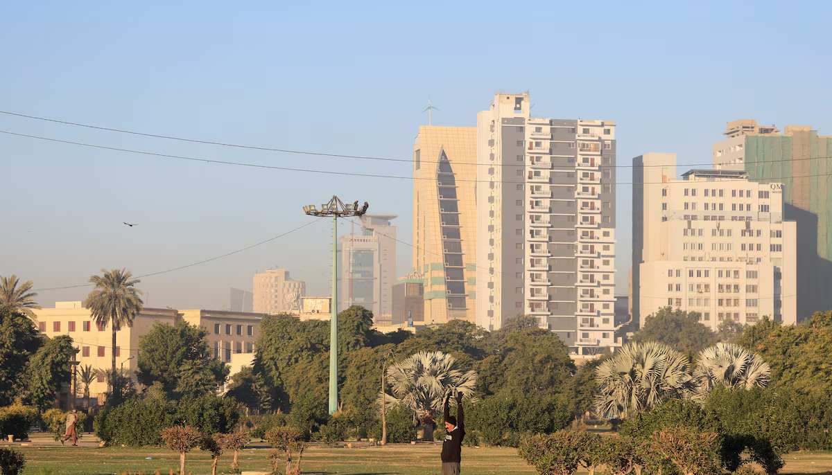 A photo of buildings overlooking a public park in Karachi on January 8, 2025. — Reuters