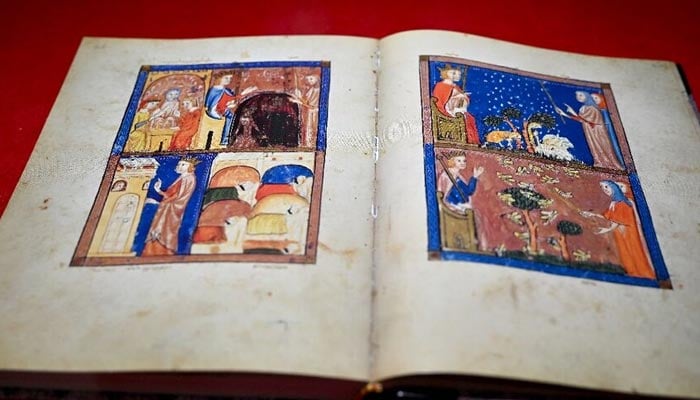 The Haggadahs illuminated and well-preserved parchment pages narrate the creation of the world and the exodus of the Hebrews from Egypt. — AFP