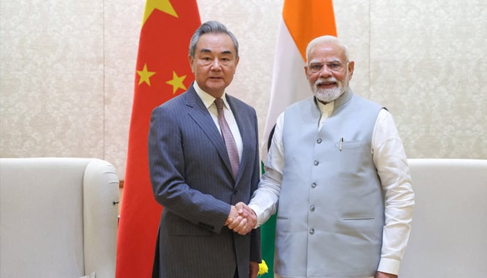 Indias Prime Minister Narendra Modi shakes hand with Chinese Foreign Minister Wang Yi during their meeting in New Delhi, India August 19, 2025. — Reuters