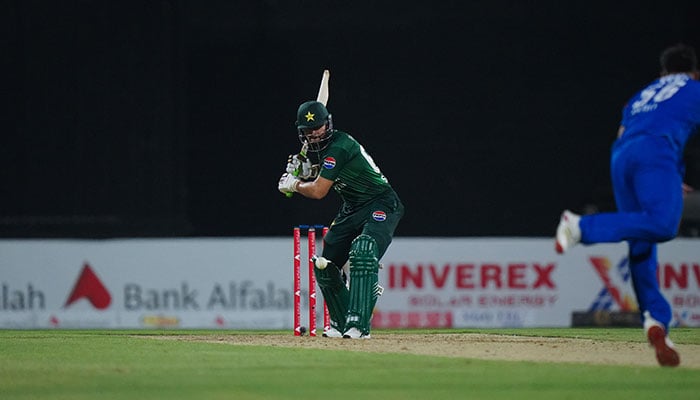 Pakistan skipper Salman Ali Agha plays a shot against Afghanistan during their UAE Tri-Series match at the Sharjah Cricket Stadium in Sharjah on August 29, 2025. — Emirates Cricket Board